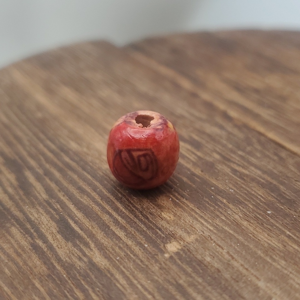 Tiki sunrise patterned bead charm